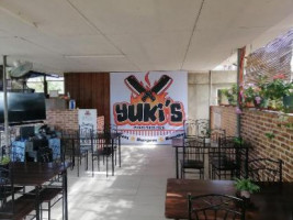 Yuki's Beers. Burgers. Burritos inside