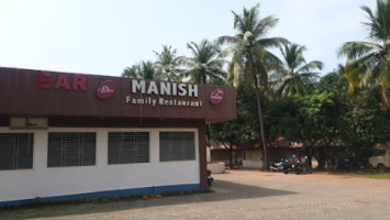 Manish Family outside