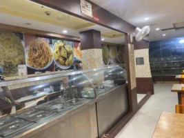 Taj Sweets & Veg Restaurant inside