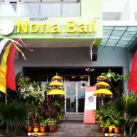 Nona Bali outside
