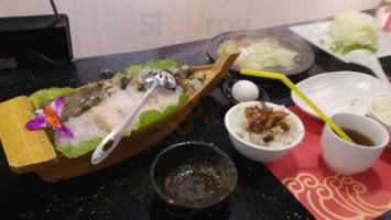 Jiǔ Tāo Shí Tóu Huǒ Guō food
