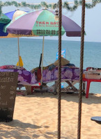 Nhà Hàng Coastal Village Beach outside